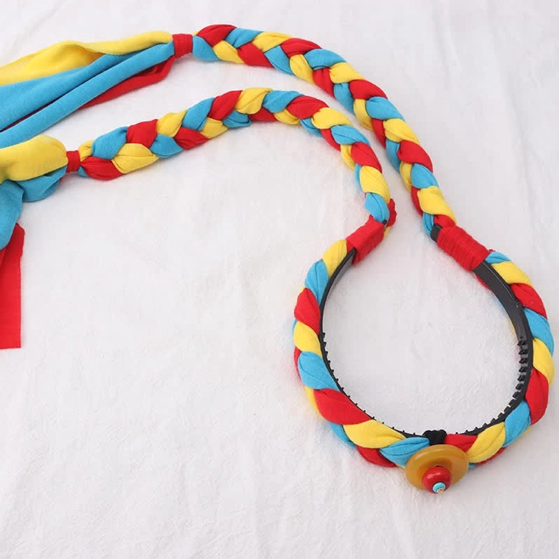 Tibetan handcrafted hair accessory with yellow round bead pattern and traditional fabric tassels