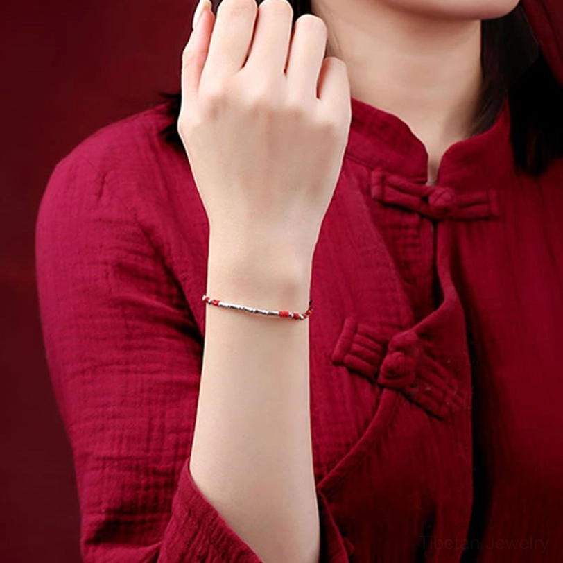 Tibetan handmade braided protection bracelet featuring traditional weaving technique and copper metal accents