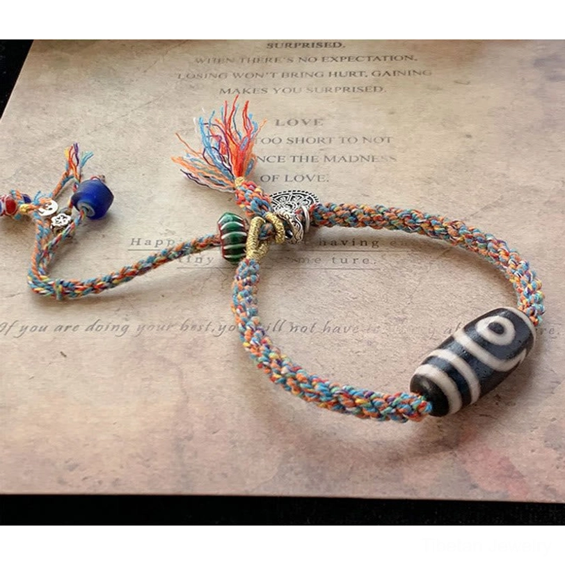 Handmade Tibetan Nine-Eye Dzi bead bracelets collection showing natural material variations and authentic craftsmanship