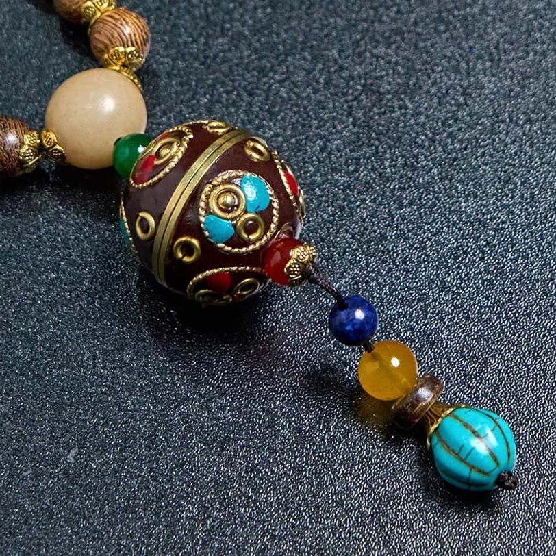 Tibetan authentic handmade mala necklace with natural schima wood and coconut shell materials