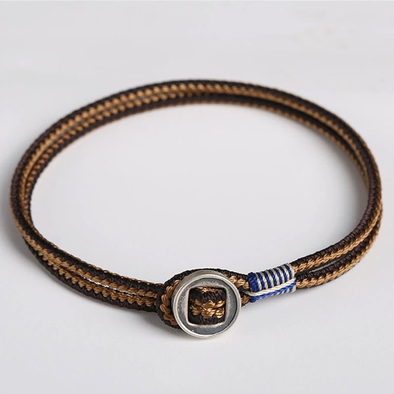 Tibetan handmade silver protection bracelet with traditional woven cord design, spiritual guardian talisman