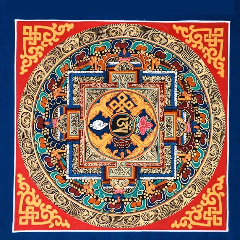 Authentic Tibetan handmade thangka showing layered gilt designs and sacred religious iconography