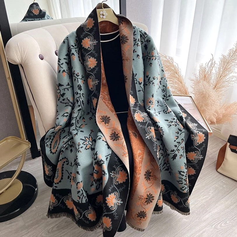 Tibetan handwoven shawl with intricate paisley motif showing artisanal weaving quality