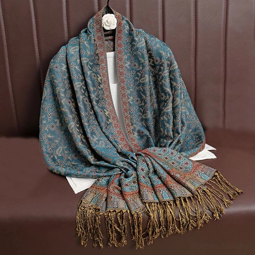 Tibetan handwoven paisley shawl detail highlighting the all-over jacquard weave pattern and traditional Himalayan design motifs