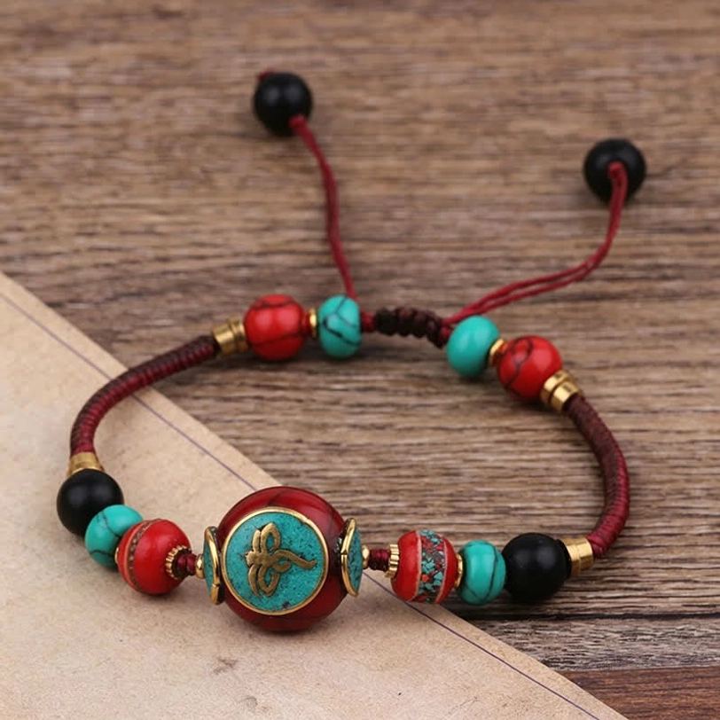 Handcrafted Tibetan braided rope bracelet with natural turquoise and amber beads collection