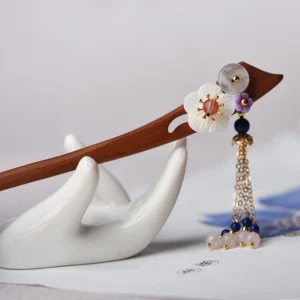 Handcrafted sandalwood hairpin with pink crystal flower pendant and blue bead chain tassel