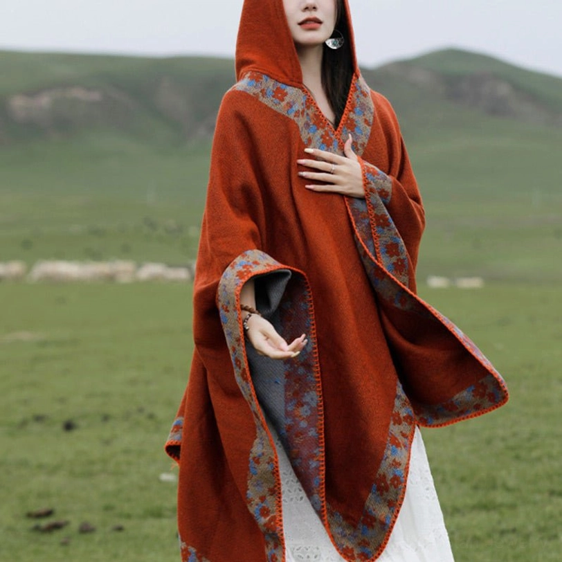 Tibetan hooded cloak worn with hood up, side front view showing protective hood design and relaxed oversized fit