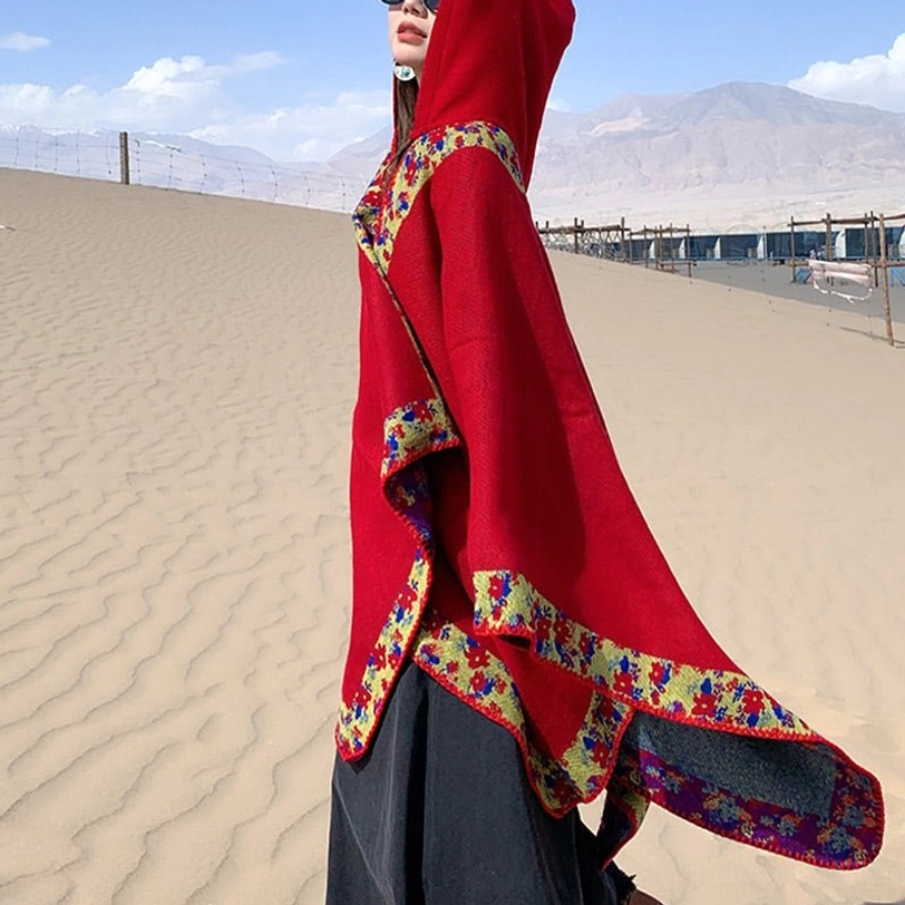 Red Tibetan hooded cloak front view with protective hood and intricate floral border details