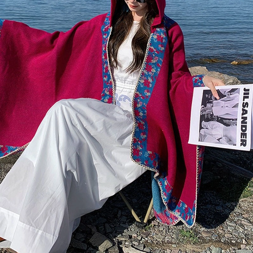 Tibetan hooded wrap shawl worn by multiple people showing versatile sizing and cultural appreciation