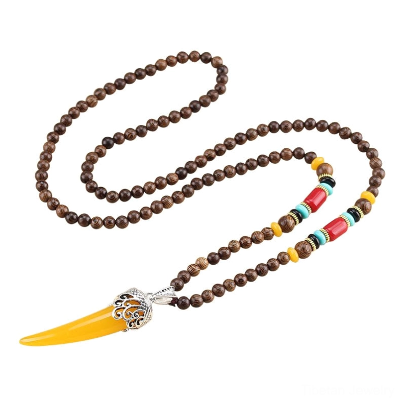 Yellow tooth horn pendant with brown wenge wood bead strand and colorful turquoise accent beads - full necklace view