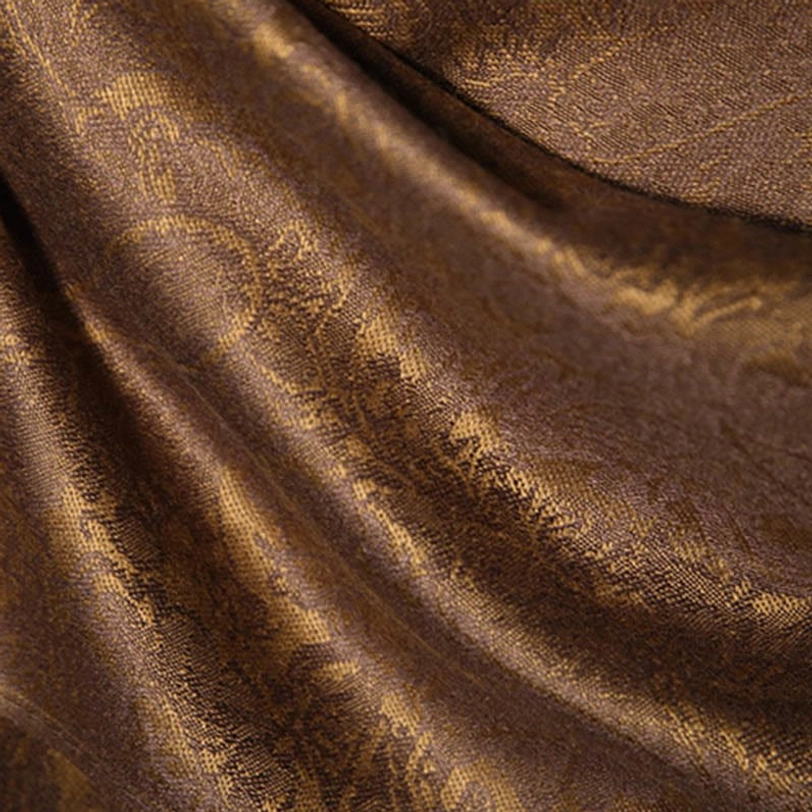 Tibetan jacquard fabric extreme close-up - woven paisley texture detail