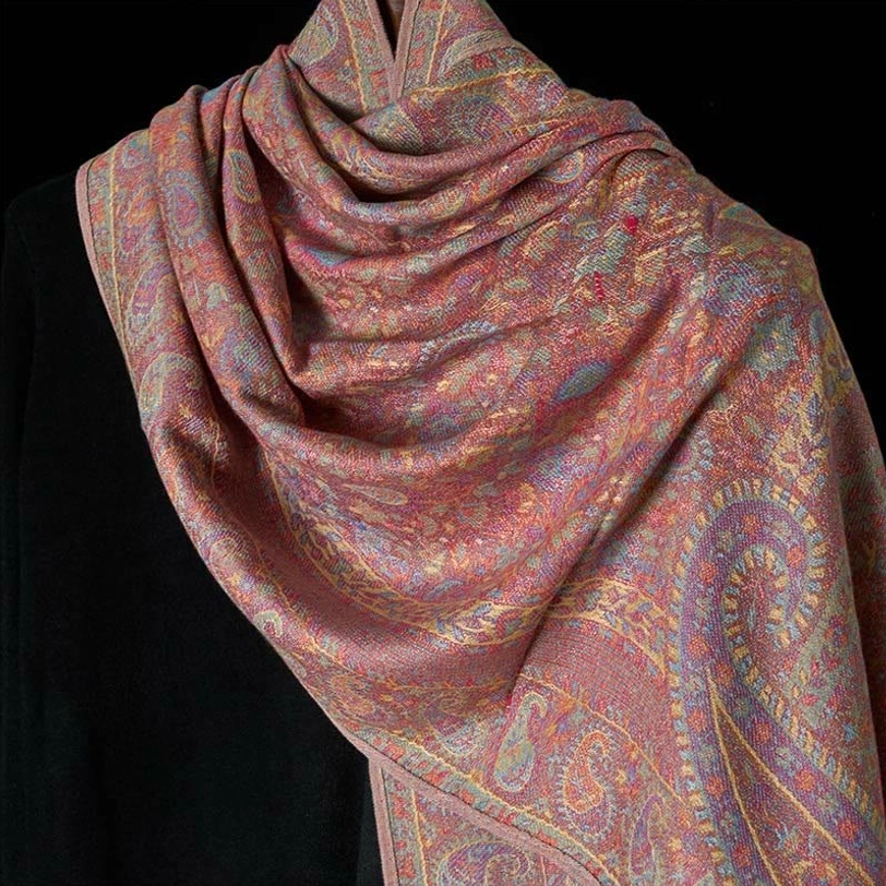 Close-up front view of Tibetan jacquard paisley scarf fabric, highlighting cozy texture and pattern detail
