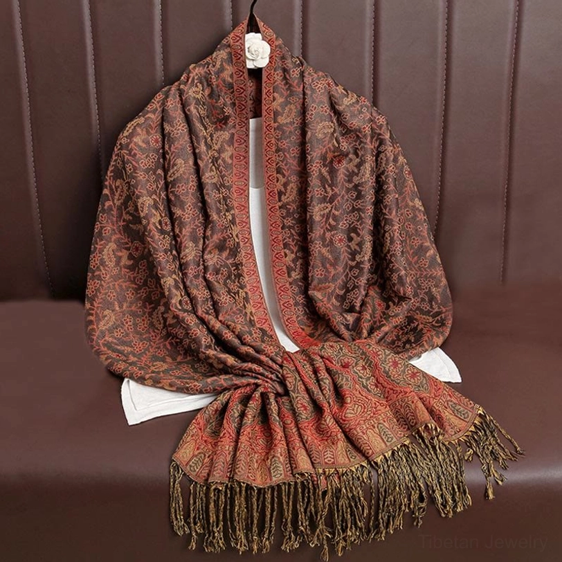 Tibetan jacquard paisley shawl in brown earth tone showing natural warm palette options and traditional Himalayan aesthetic