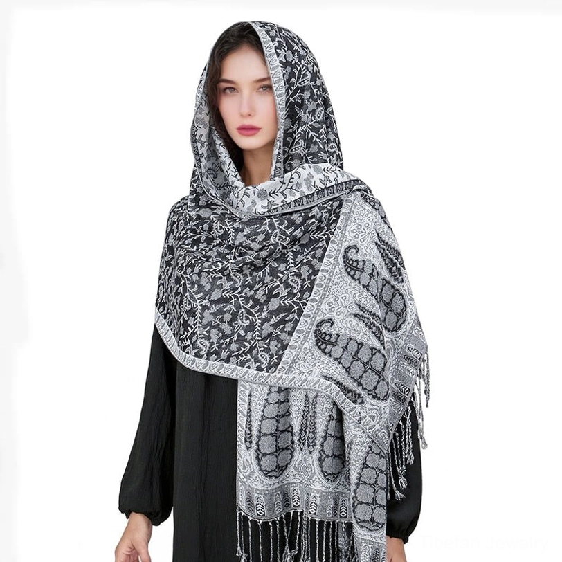 Tibetan jacquard shawl textured surface detail showing premium fabric quality and soft drape characteristic of rayon polyester blend