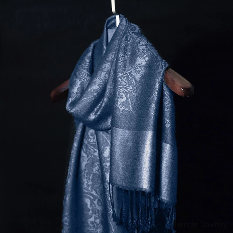 Tibetan jacquard shawl with tassels - product photography flat lay