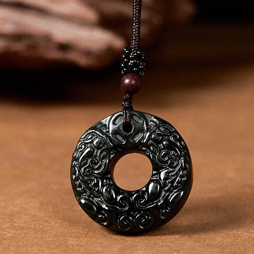 Nanyang black-green jade peace buckle pendant with Pixiu carvings and braided cord necklace