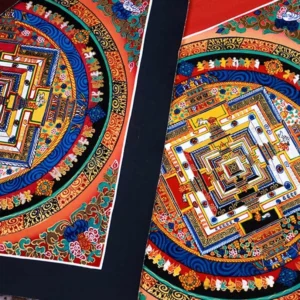 Tibetan Kalachakra Mandala Thangka with intricate multicolored symmetrical patterns and dark border - close-up overhead view