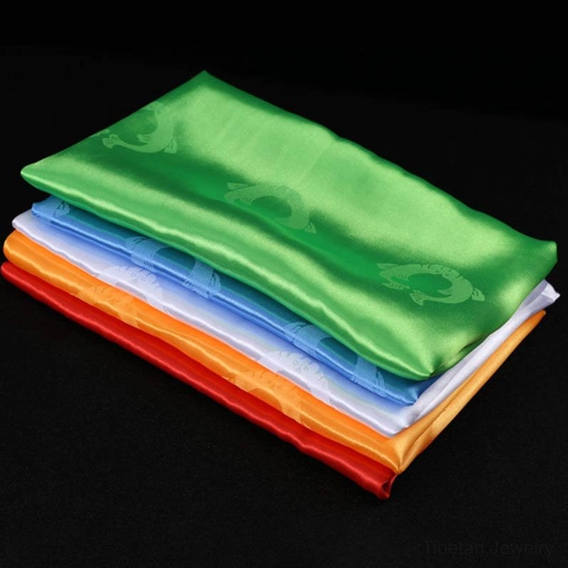 Tibetan khata silk scarves with embossed Buddhist auspicious symbols and protective blessing patterns