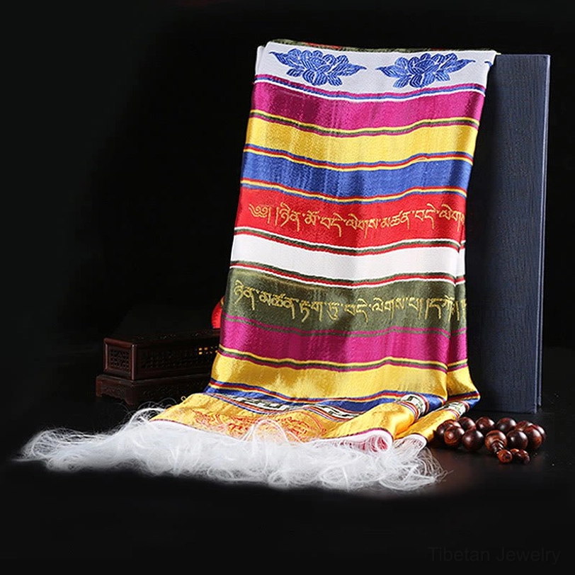 Full tibetan multicolored khata scarf flat display showing Tibetan script embroidery, white tassels, and striped design