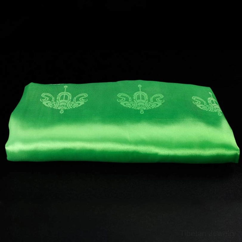 Single green Tibetan khata with satin silk fabric and golden embossed decorative auspicious patterns
