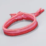 Tibetan King Kong knot braided bracelet set of 3 pieces with gradient red tones and adjustable woven tassels - front and top view