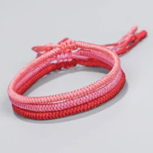 Tibetan King Kong knot braided bracelet set of 3 pieces with gradient red tones and adjustable woven tassels - front and top view