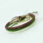 Tibetan King Kong Knot bracelet with colorful woven cord and protective knot detail, worn on wrist