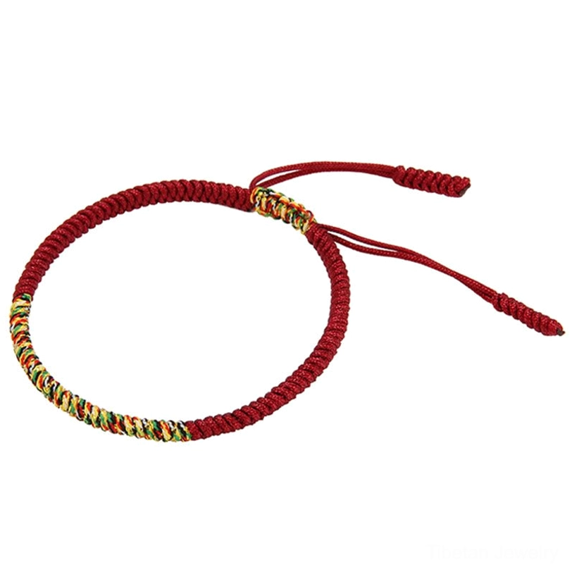 Single red and multicolor Tibetan King Kong knot bracelet with adjustable pull cords and tassel ends, white background
