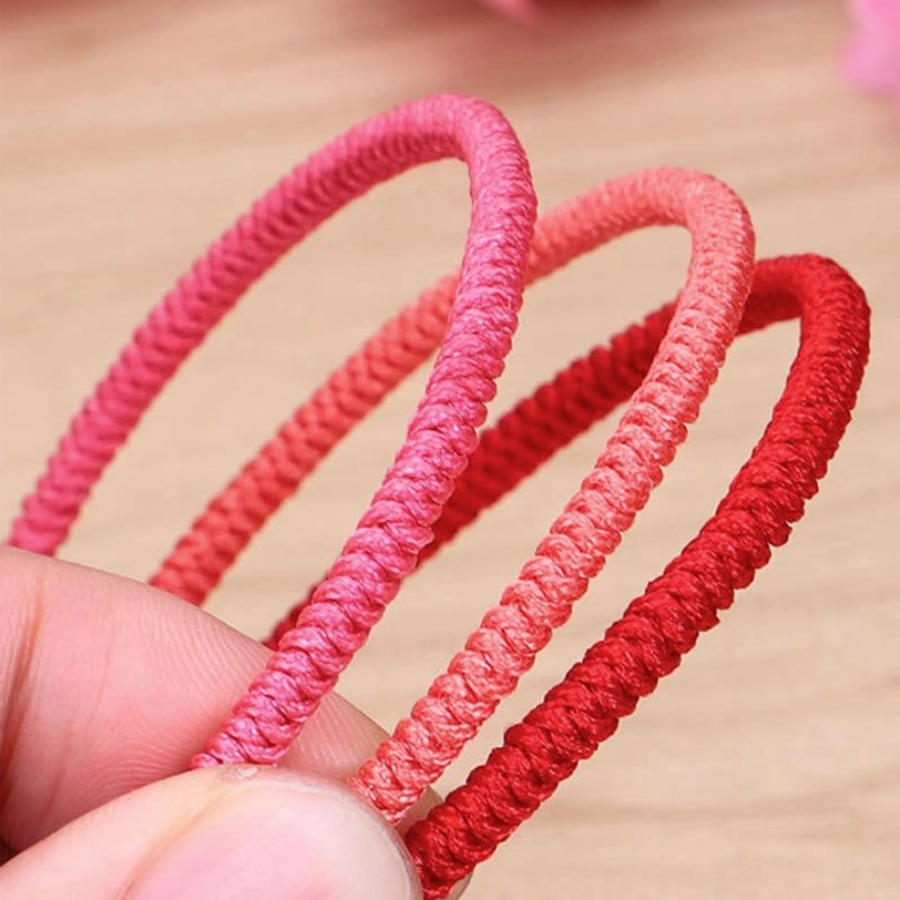 Close-up of Tibetan King Kong knot braided bracelet showing handcrafted quality and natural string material texture
