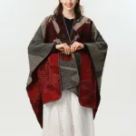 Tibetan koi fish wave jacquard shawl poncho worn as reversible wrap - front view with grey koi pattern