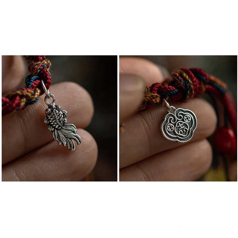 Authentic handmade Tibetan protection bracelet with koi fish charm worn as daily mindfulness accessory