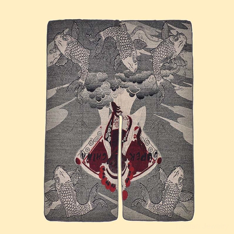 Tibetan koi fish shawl flat lay top view showing grey base with red-white koi print and split center opening