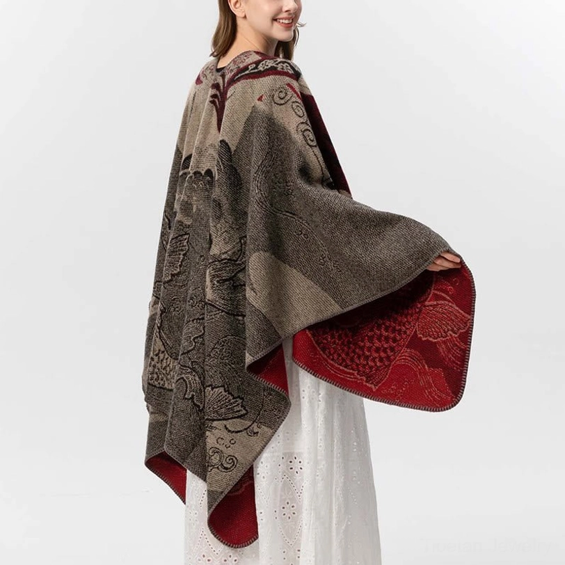 Tibetan koi fish wave poncho shawl back side view showing grey woven pattern and red inner hem