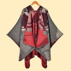 Tibetan reversible koi poncho shawl hanging display showing jacquard weave and red inner lining