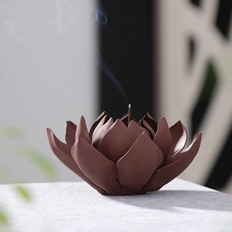 Deep maroon Tibetan lotus incense holder rear side view showing smooth matte petal texture with incense smoke