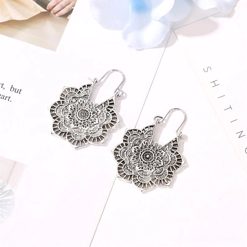 Silver tibetan lotus blessing earrings delicate hollow mandala carving artisan crafted