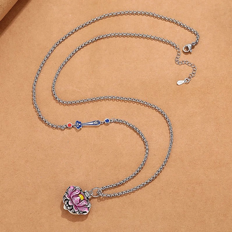 Full length tibetan lotus necklace with silver rolo chain and small lotus pendant overhead view