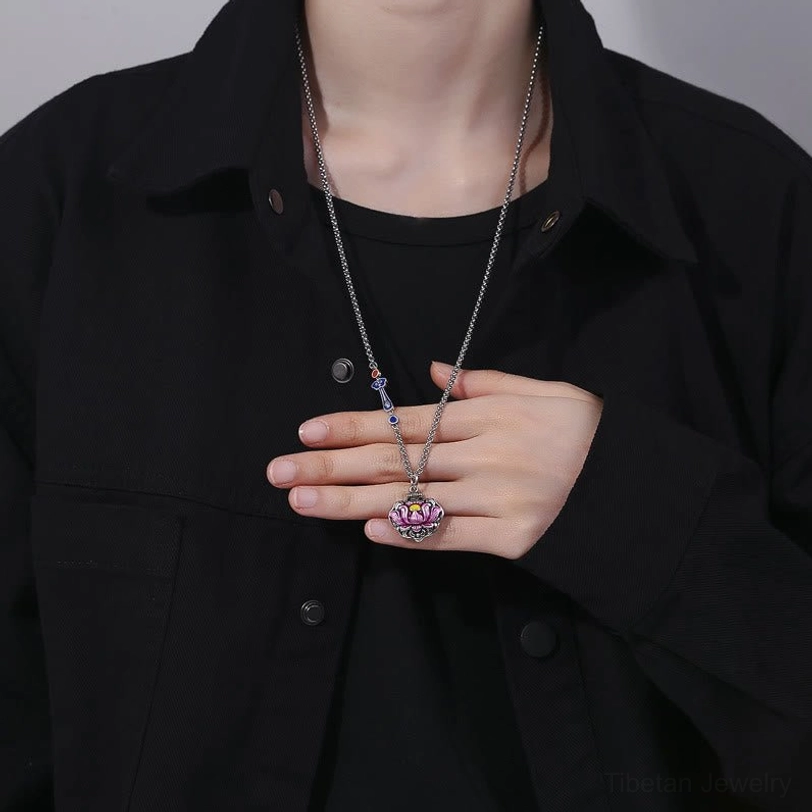 Tibetan lotus necklace worn on chest over black shirt, daily wear styling