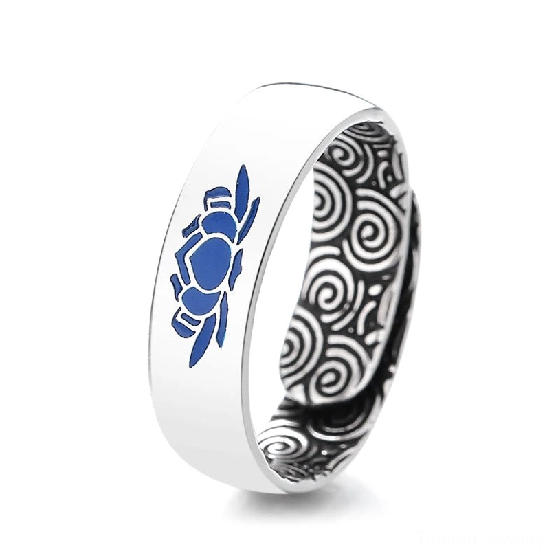 Blue lotus auspicious clouds ring flat lay on white background displaying full front pattern and open adjustable band