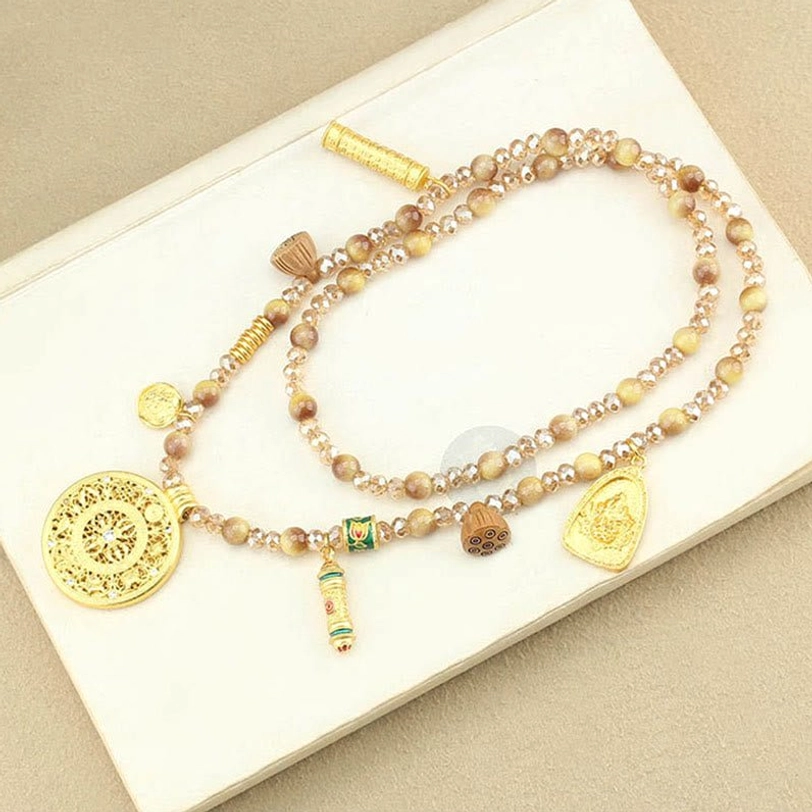 Tibetan lotus round plate golden tiger eye beads necklace pendant with spiritual symbolism