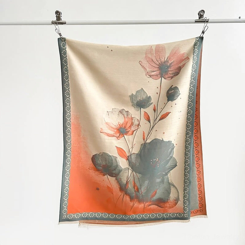 Full front view of beige base tibetan lotus scarf with orange-gray watercolor blooms and geometric border hanging display