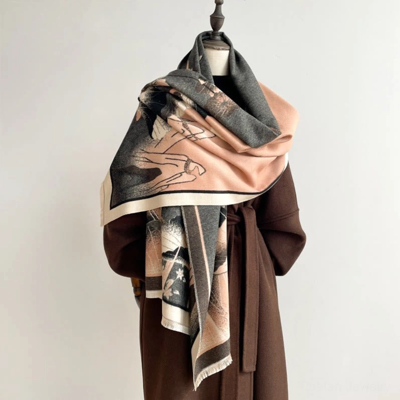 Tibetan lotus mountain shawl in sandy brown with ink wash landscape print, three-quarter draped view on mannequin with brown wool coat