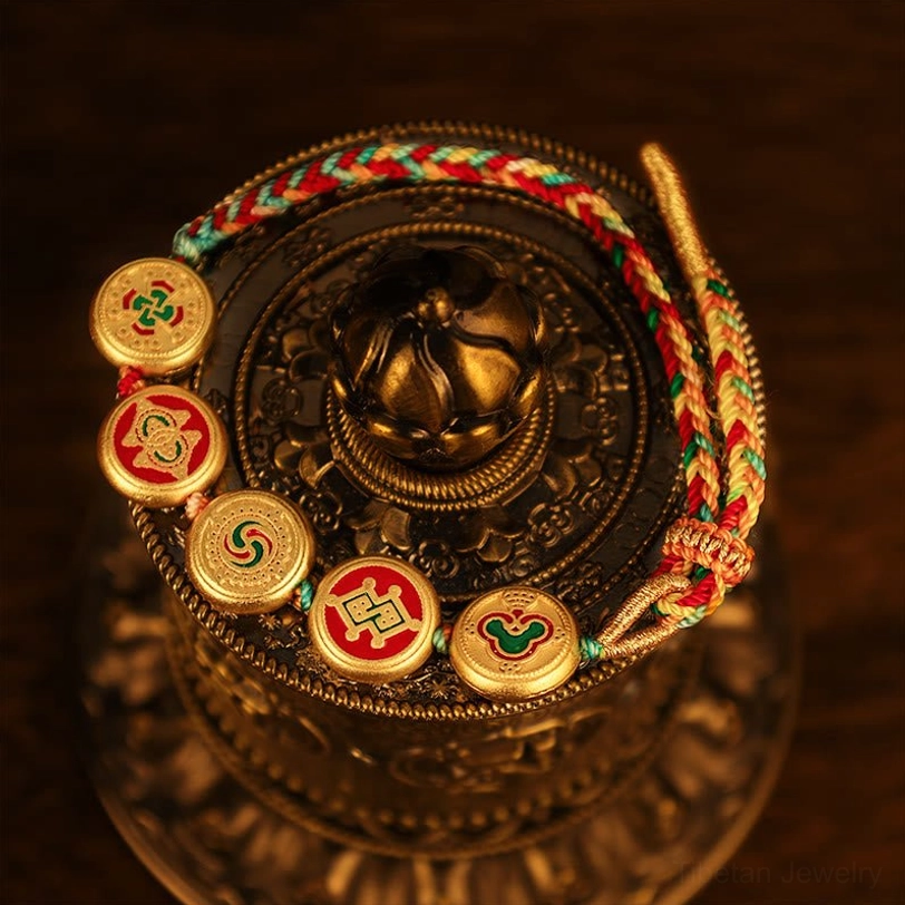 Tibetan luck bracelet handmade craftsmanship showing natural material processing and eco-friendly braided rope with enamel charm details