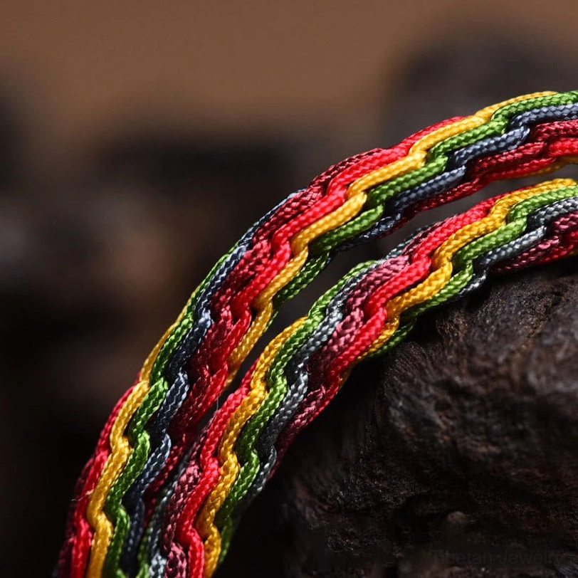 Tibetan luck knot bracelet braided rainbow cord gold swallowing beast enamel pendant spiritual wealth protection amulet