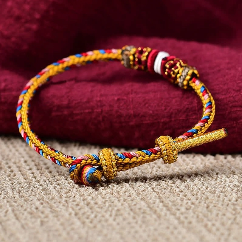Tibetan lucky bracelet flat lay with natural lighting emphasizing color details