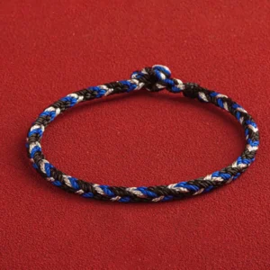 Tibetan multicolored braided lucky bracelet with king kong knot front view blue black silver weave