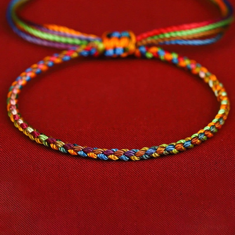 Tibetan lucky bracelet unboxing and packaging presentation with protective cord and blessing card