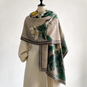 Tibetan magnolia bird reversible scarf in steel blue worn on mannequin - front view with contrasting border detail