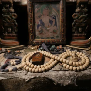 Two sets of Abelia Biflora prayer mala beads with Buddha figurine and decorative cords