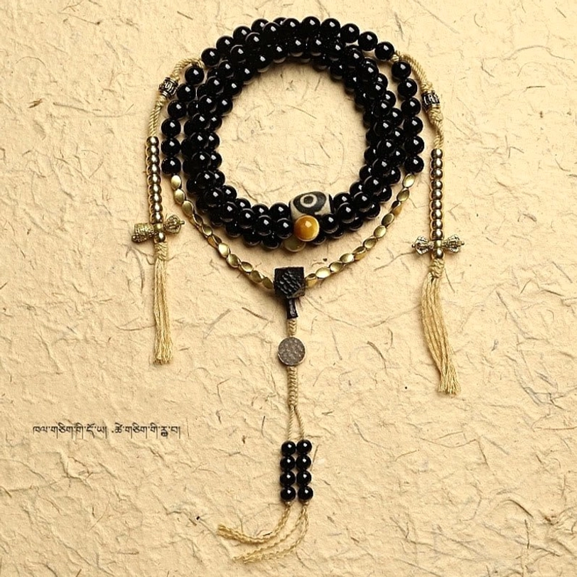 Black onyx mala bracelet with dzi bead for meditation mindfulness and spiritual practice
